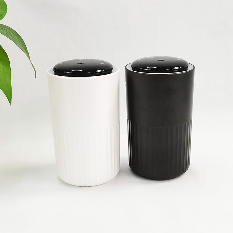 portable scent diffuser for car and desktop front view white and black variants