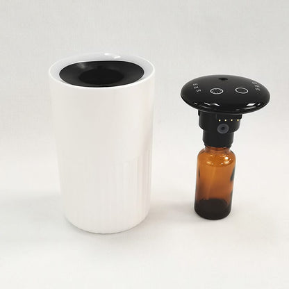 portable scent diffuser for car and desktop front view white color, and fragrance reservoir